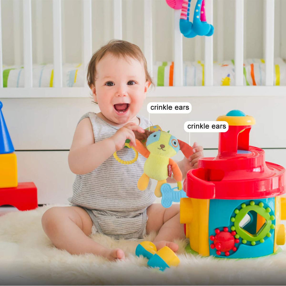 HAHA Baby Dog Clip with squeaky belly encourages grasping and sensory exploration.