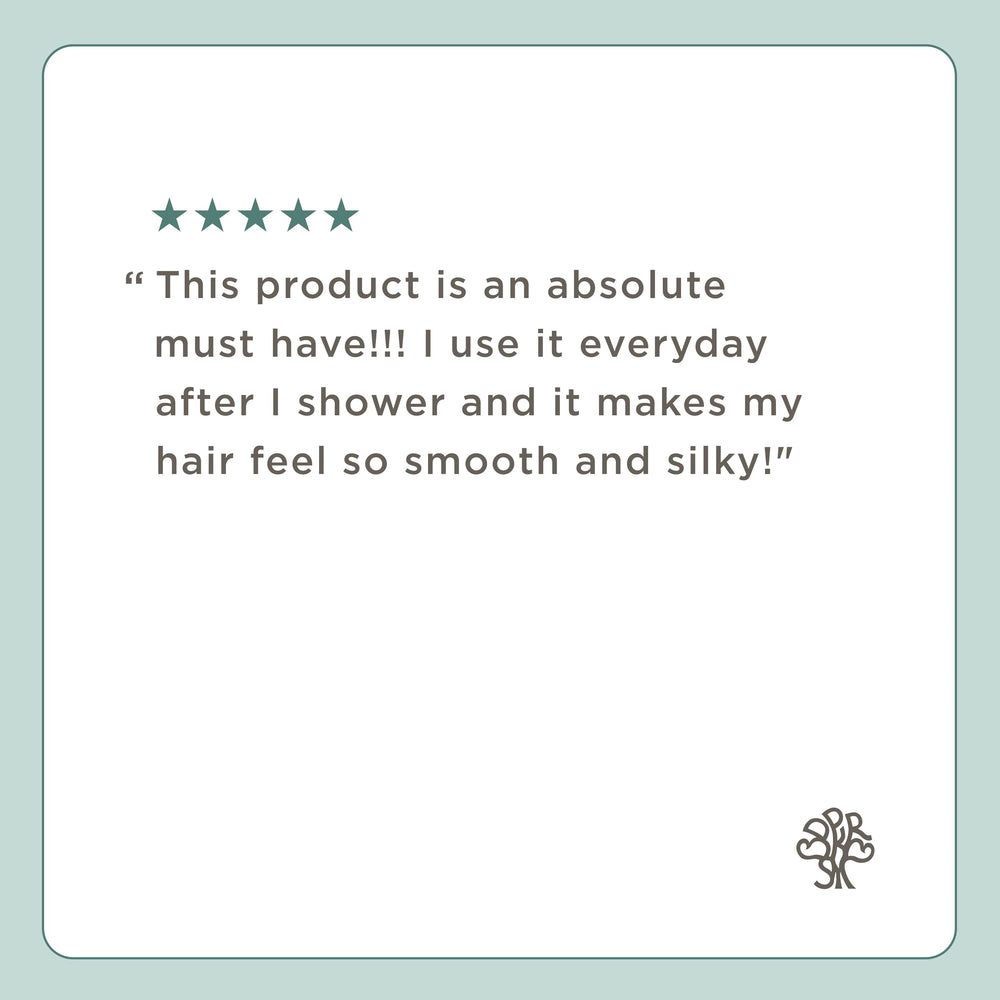 Hairitage detangling spray lightweight-formula bottle—feels feather-light on hair