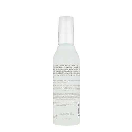 Hairitage detangling spray mist-on-hair closeup—fast detangling on damp strands
