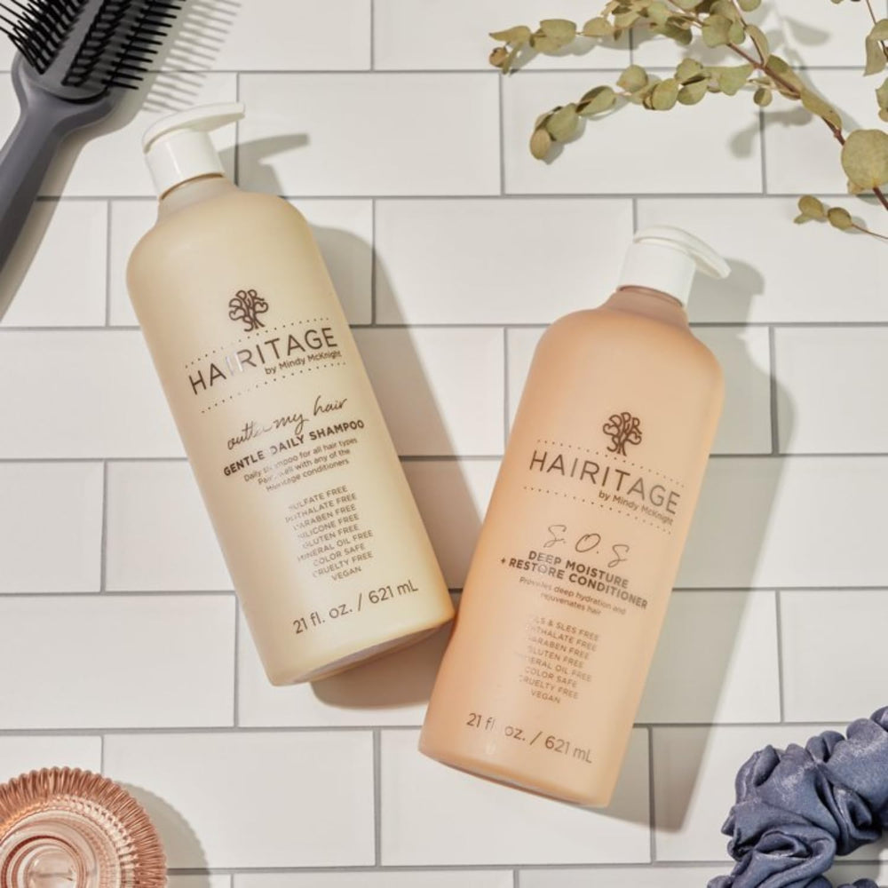 Hairitage Outta My Hair with jojoba oil emphasizes deep hydration and frizz control.