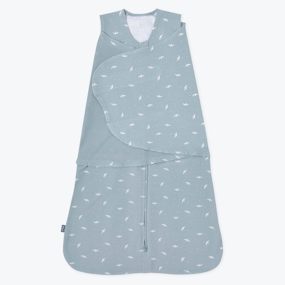 HALO Sleepsack Swaddle bird-print front view promotes snug newborn comfort.