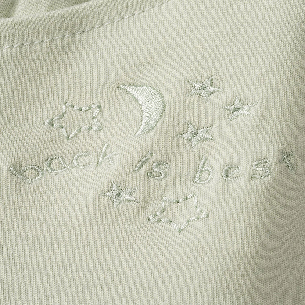 Halo Sleepsack Swaddle Sage arms-in setup demonstrates secure wrap