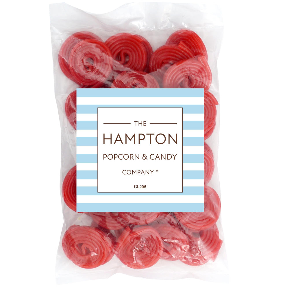 Unwrapped Broadway Strawberry Wheels licorice ready for quick snacking.