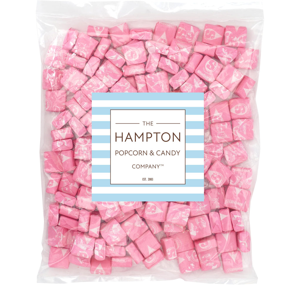 Starburst All Pink close-up shows juicy pink fruit chews perfect for snacking.