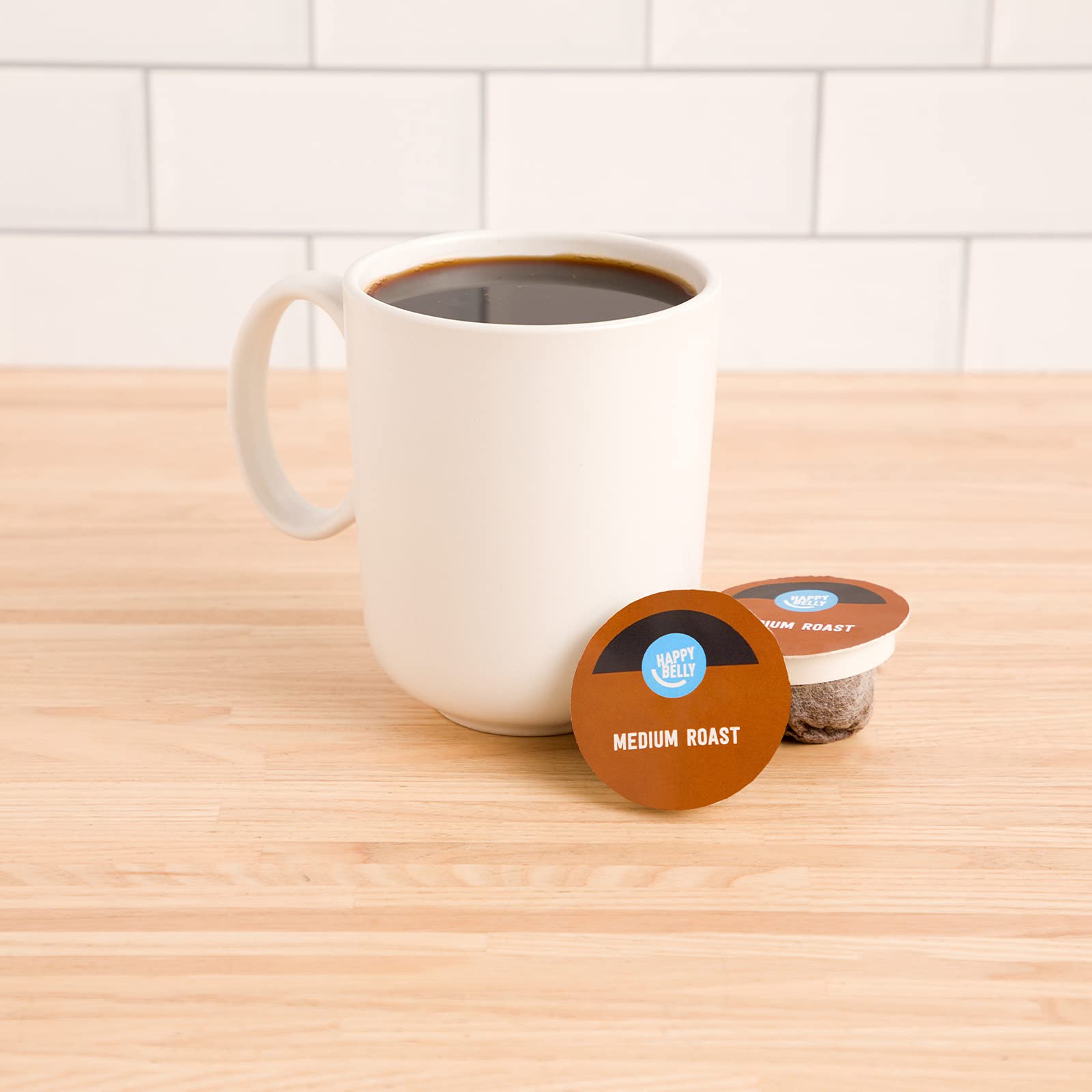 Compostable Happy Belly coffee pods ready for a sustainable morning brew.