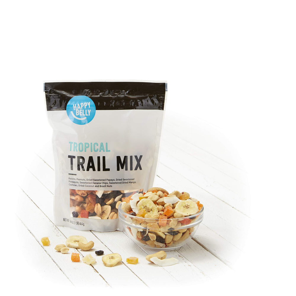 Coconut chips and banana chips with crunchy nuts in Happy Belly Tropical Trail Mix.