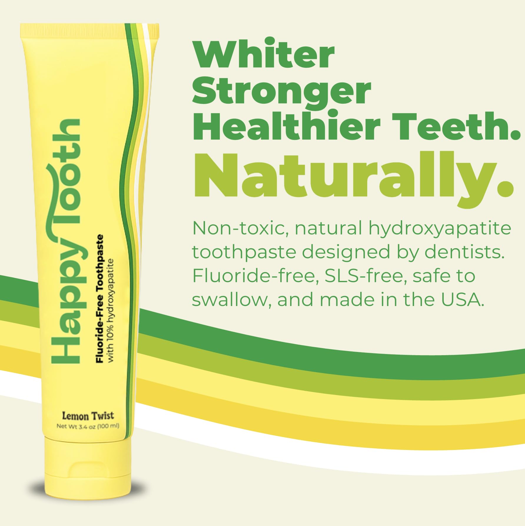 Close-up of Happy Tooth toothpaste tube highlighting lemon twist flavor.