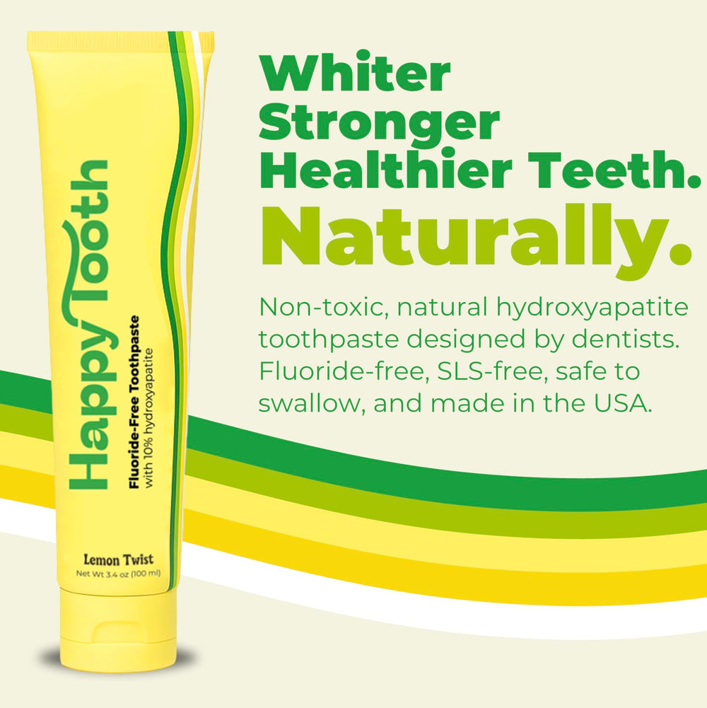Close-up of Happy Tooth toothpaste tube highlighting lemon twist flavor.