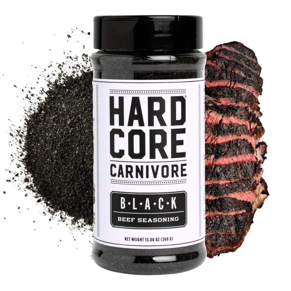 Hardcore Carnivore Black bottle front view for bold charcoal seasoning on steaks.