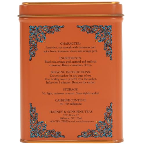 Harney and Sons cinnamon sunset sachets close-up with dark leaves.