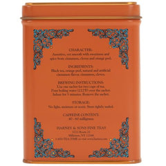 Harney and Sons cinnamon sunset sachets close-up with dark leaves.