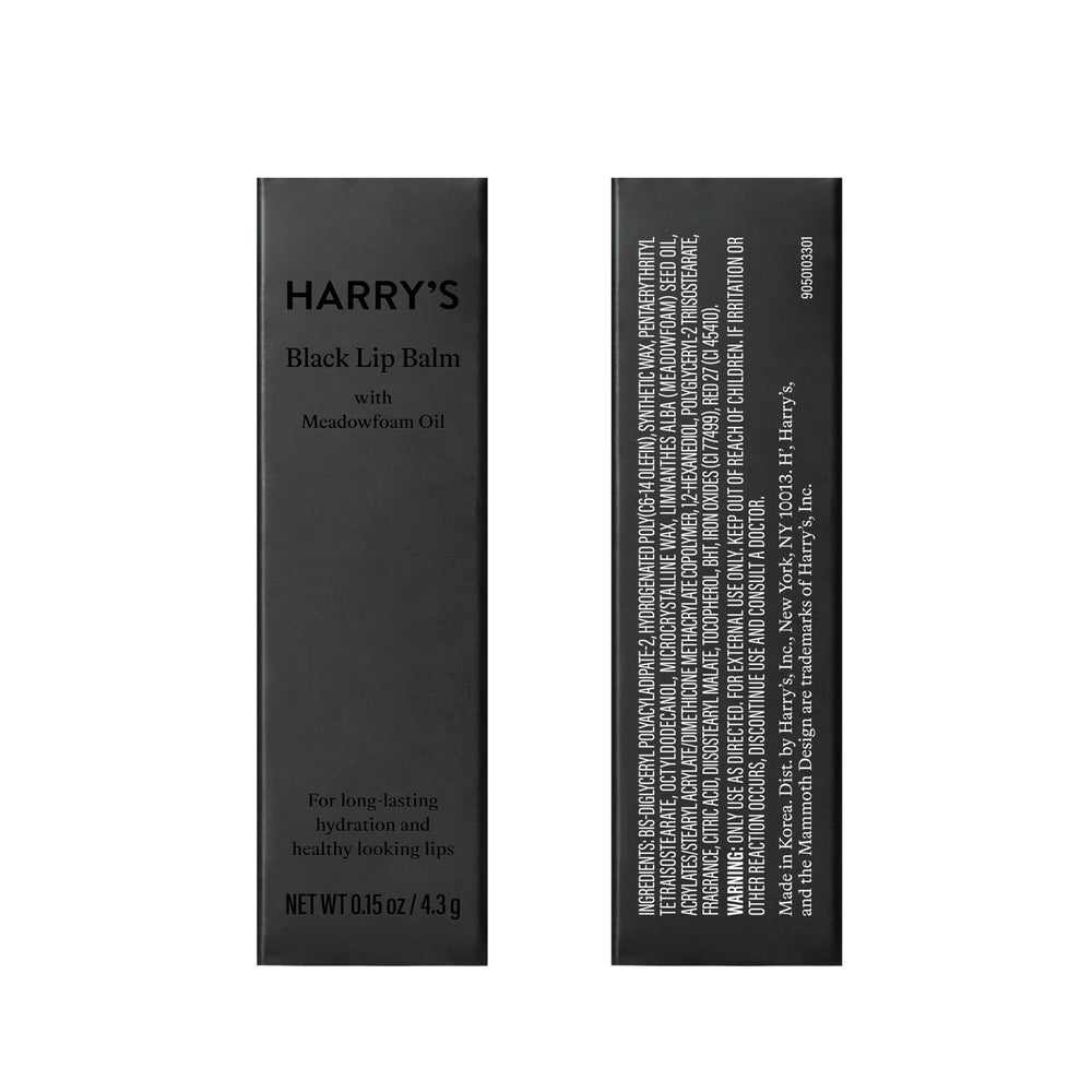 Close-up of Harry's Black Lip Balm showing a clear finish.