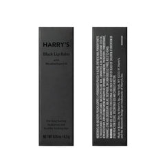 Close-up of Harry's Black Lip Balm showing a clear finish.