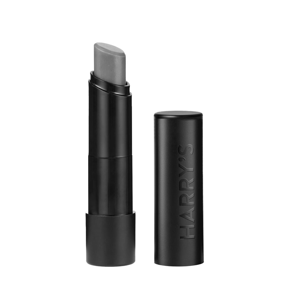 Harry's Black Lip Balm front view, compact for on-the-go hydration.