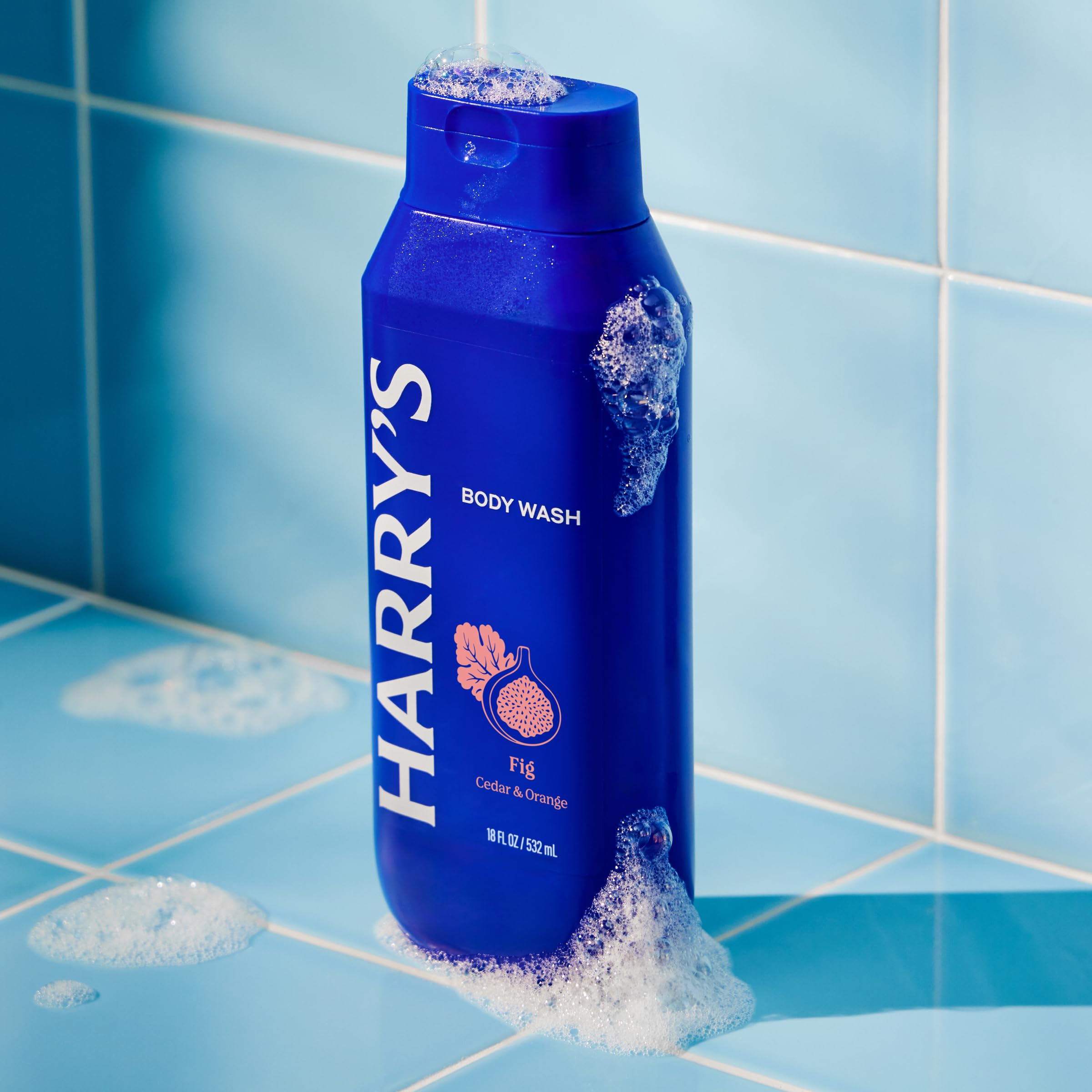 Harry's Fig scent with cedar and orange notes, refreshing aroma.