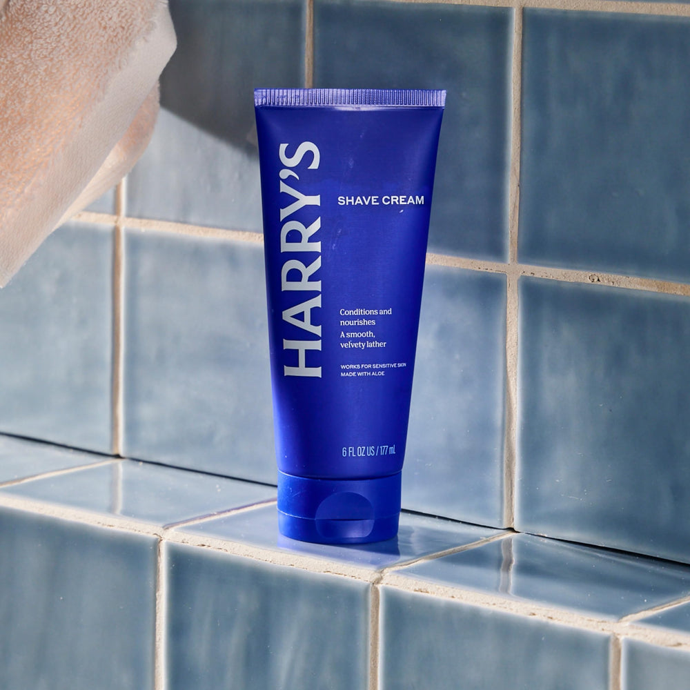 Close-up of Harry's shave cream massaged onto wet skin for cooling feel.