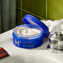 Harry's Texturizing Putty on dry hair delivers matte finish and texture