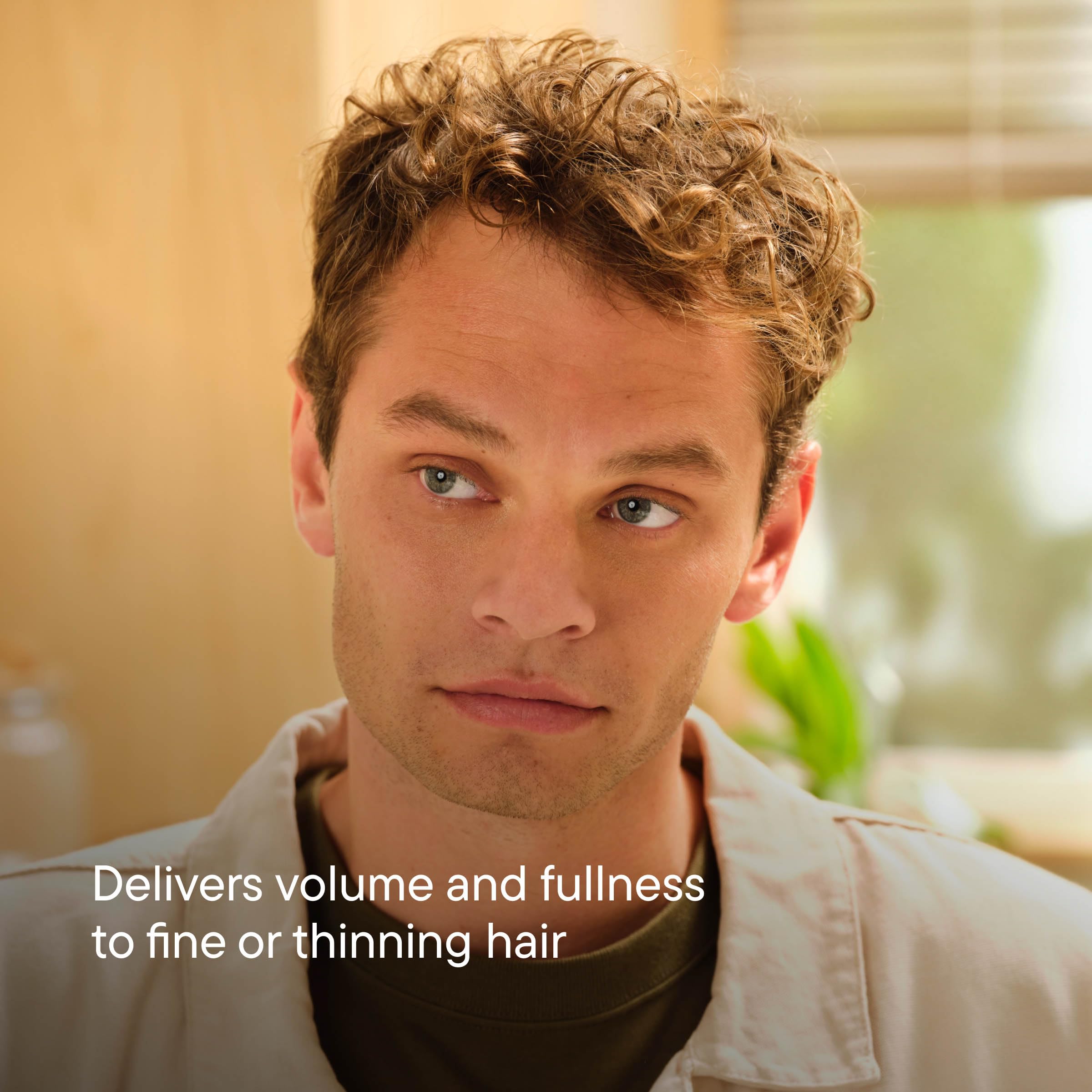 Harry's Weightless Volumizing Cream bottle-dispense demonstrates easy, mess-free styling with lasting lift.