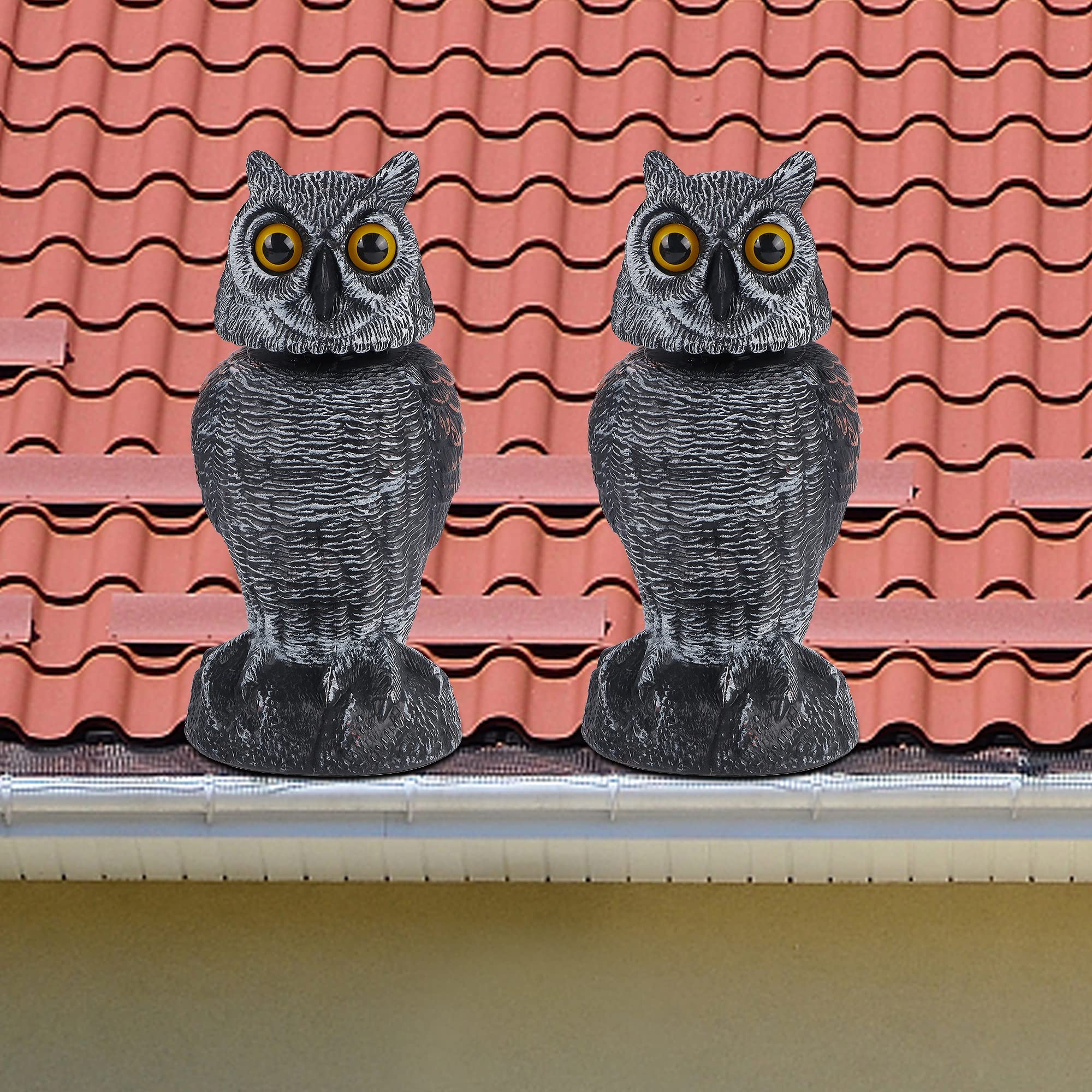 Hausse plastic owl sculpture for outdoor use on patios and yards.