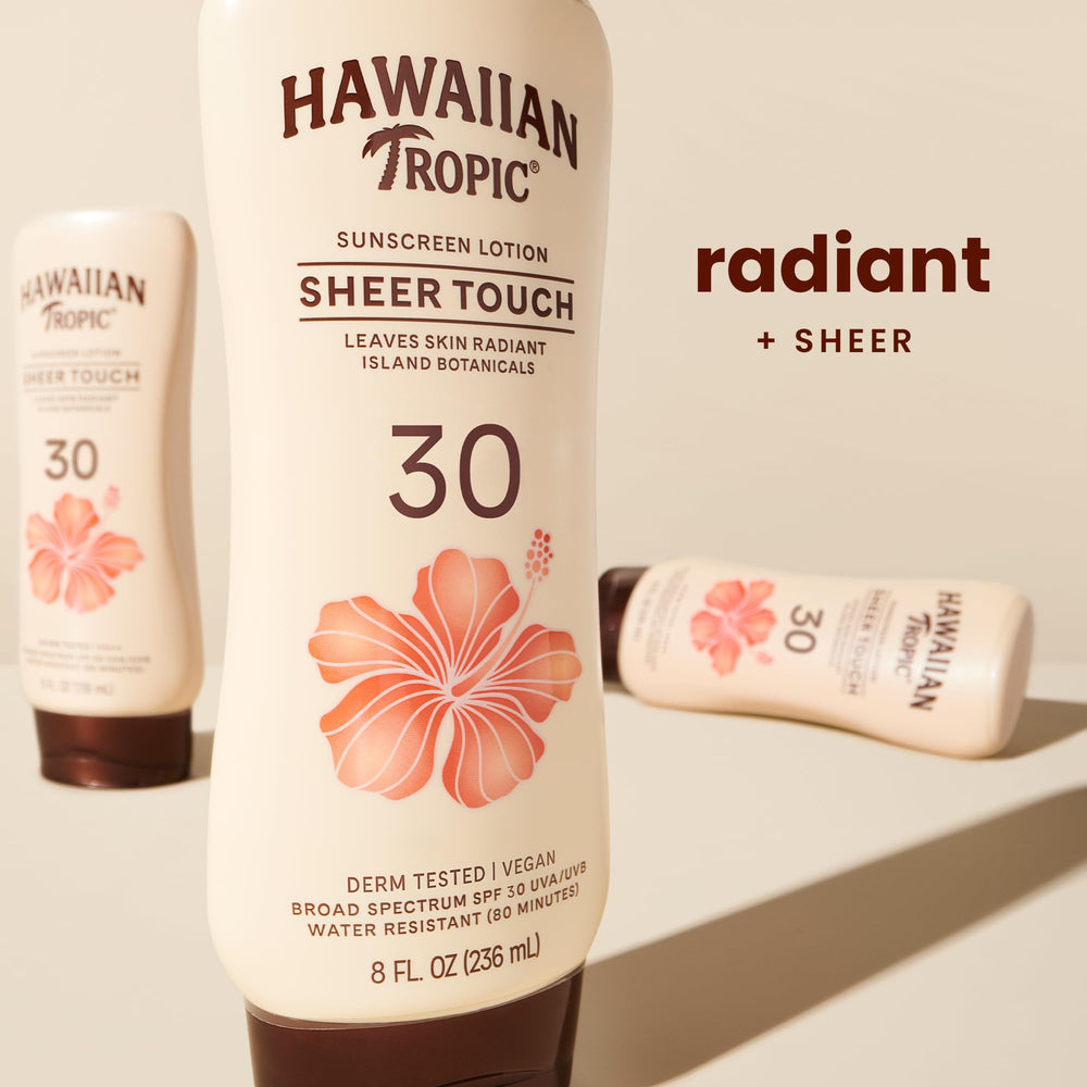 Hawaiian Tropic Sheer Touch lotion on skin shows even spread and light sheen.