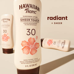 Hawaiian Tropic Sheer Touch lotion on skin shows even spread and light sheen.