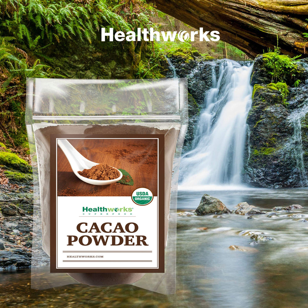 Healthworks Cacao Powder sifted on a clean surface, showing powder texture.
