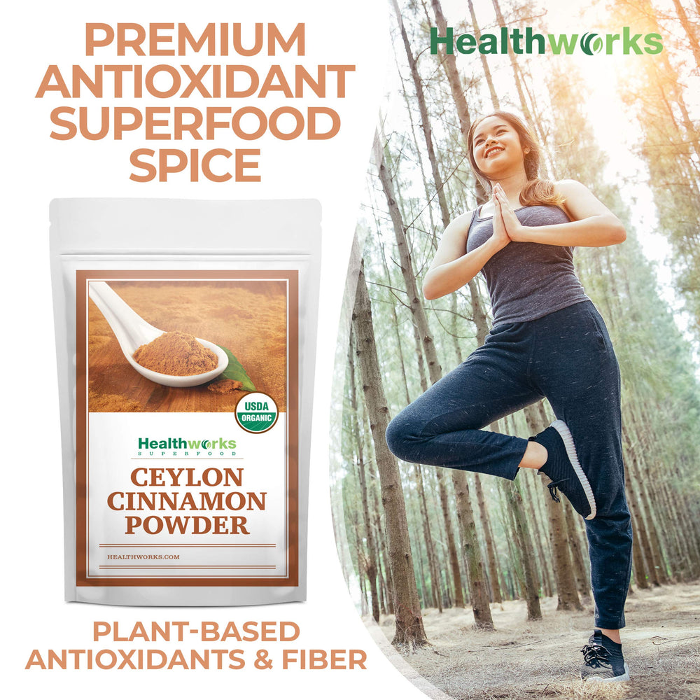 Healthworks Ceylon Cinnamon Powder beside a coffee cup for Keto-friendly flavor.