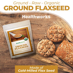 Healthworks Flax Seed Organic Powder being poured, showing a smooth earthy texture.