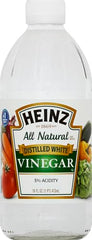HEINZ white vinegar on a kitchen counter, ready for sauces and dressings.