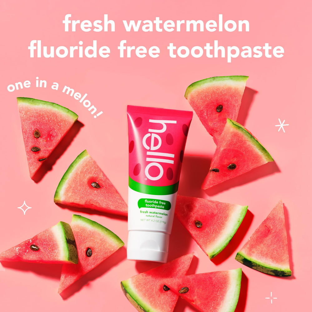 Hello Fresh Watermelon toothpaste tube close-up emphasizing fluoride-free formula for kids.
