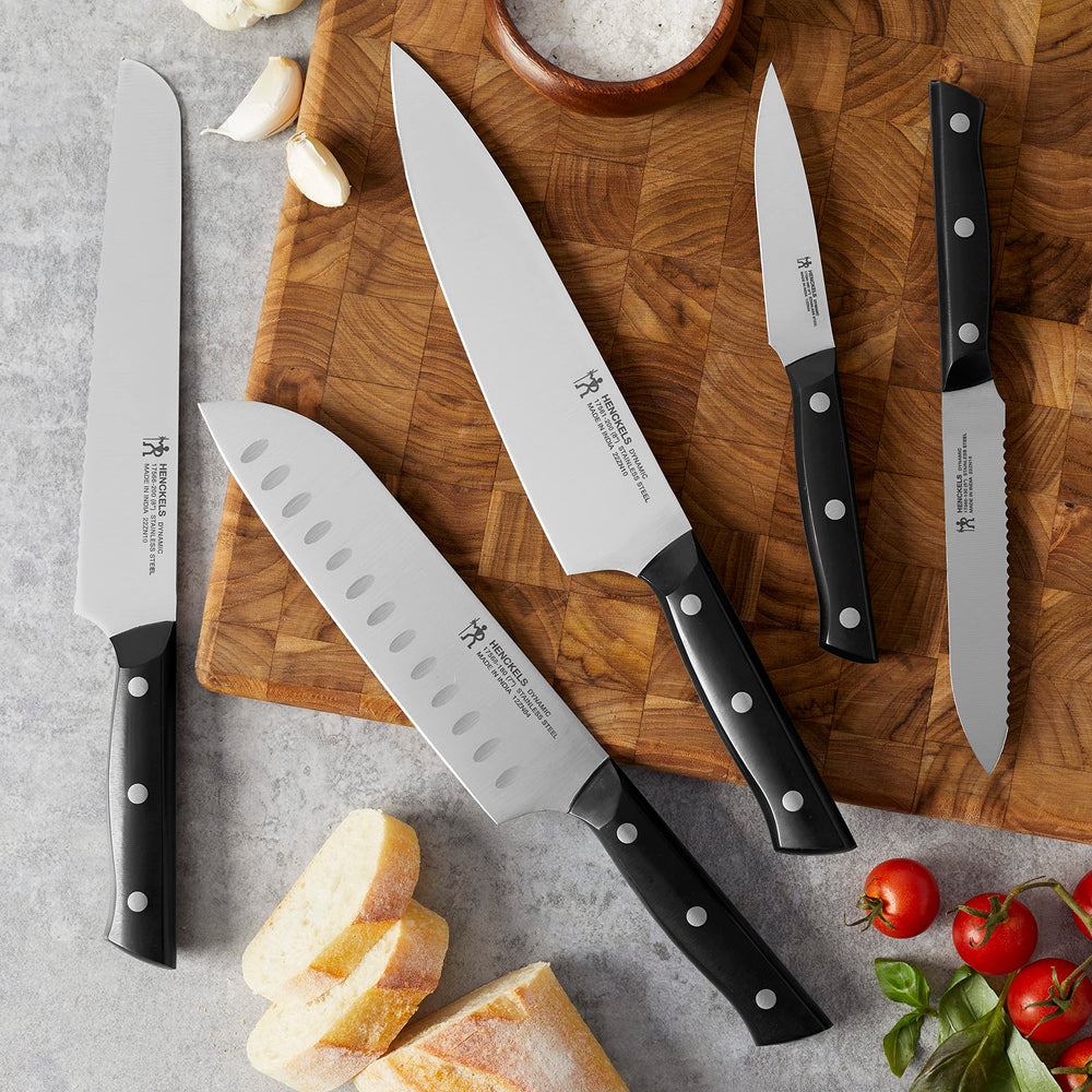 HENCKELS Dynamic 7-inch hollow-edge santoku knife for mincing and slicing versatility.
