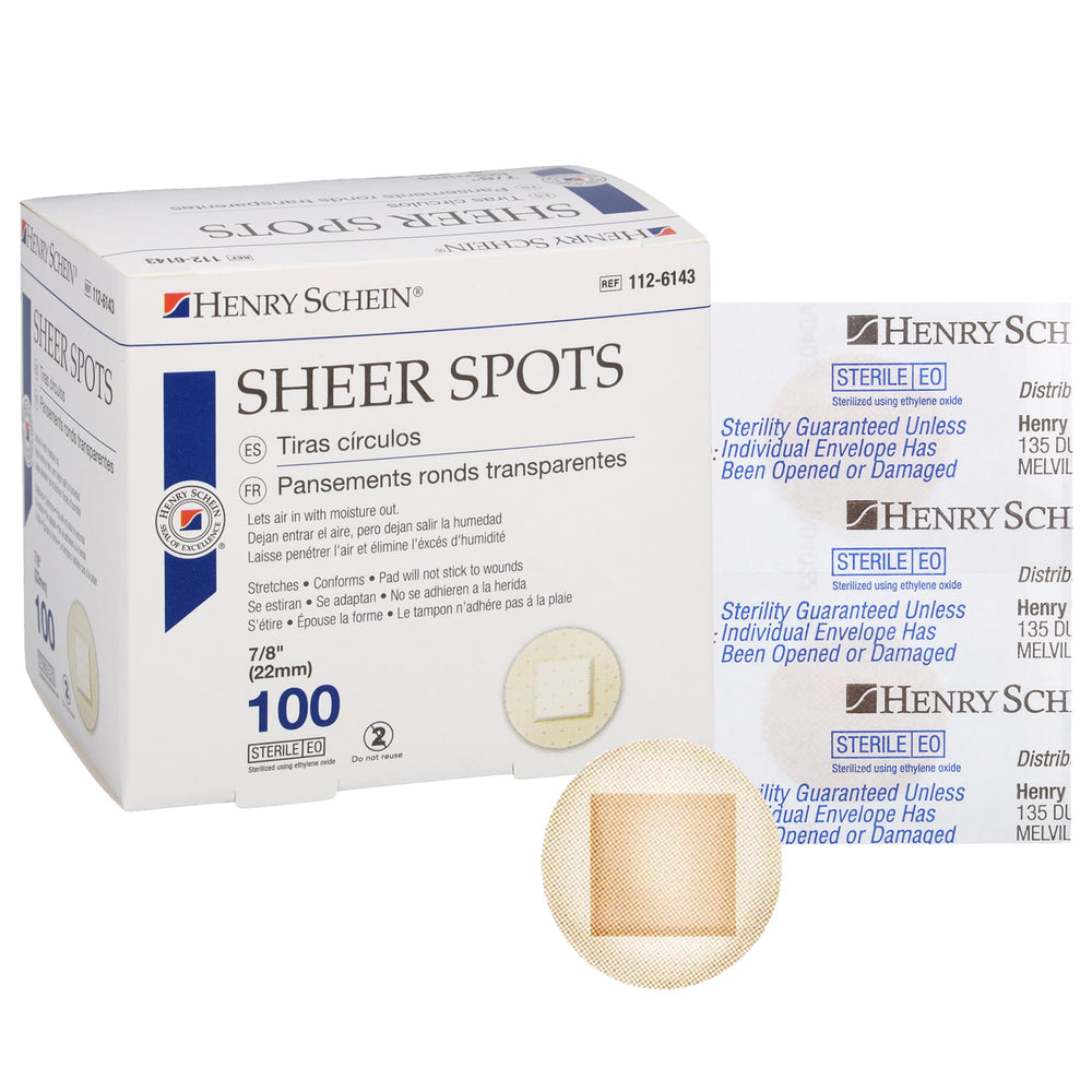 Henry Schein adhesive sheer spot bandage 7/8 inch on skin for secure minor-wound coverage.