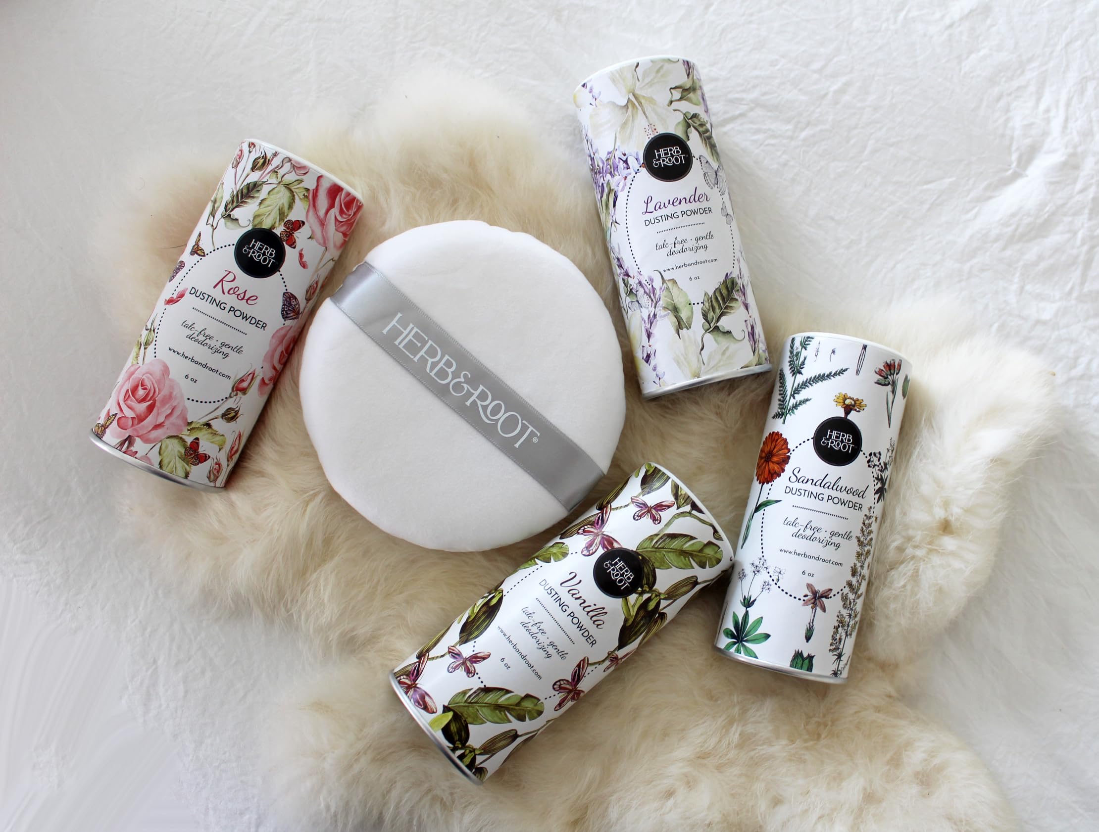 Herb & Root display of powder jars and gift-ready packaging.