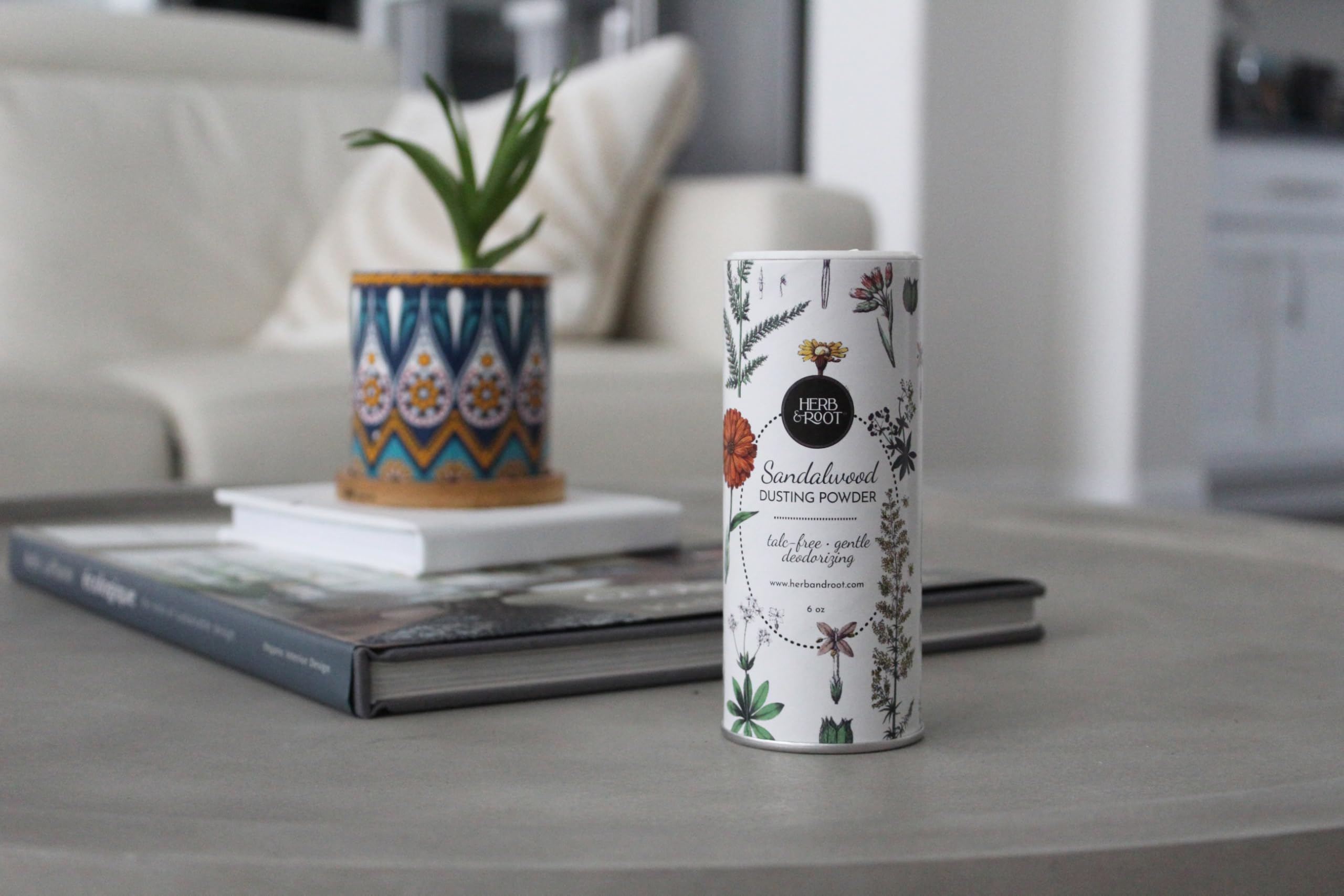 Herb & Root Sandalwood dusting powder used as a dry shampoo for quick refresh.