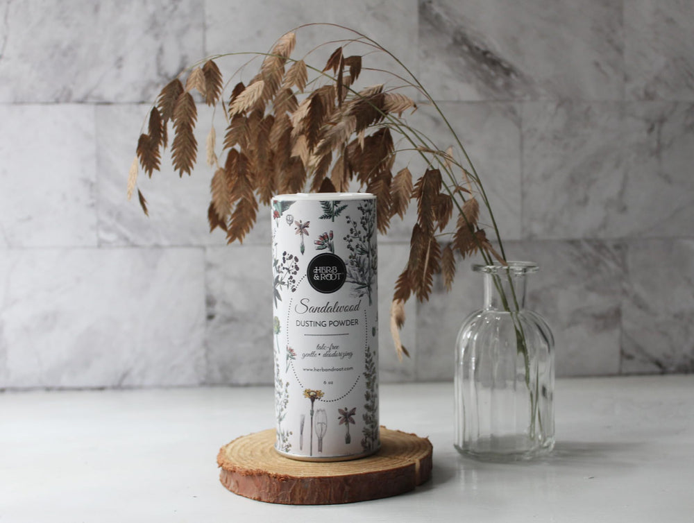 Herb & Root Sandalwood dusting powder on feet demonstrates fresh, odor-controlled wear.