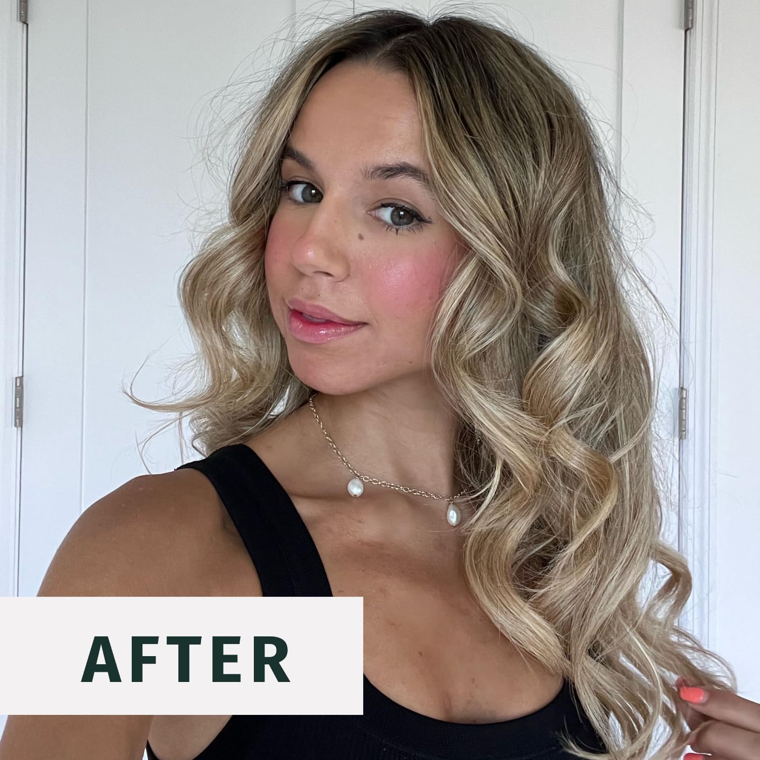 Herbal Essences Volume Hairspray demonstrates root-to-tip volume on hair