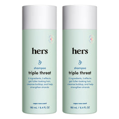 Hims & Hers Triple Threat Shampoo bottle close-up, biotin-enhanced formula for fuller hair.