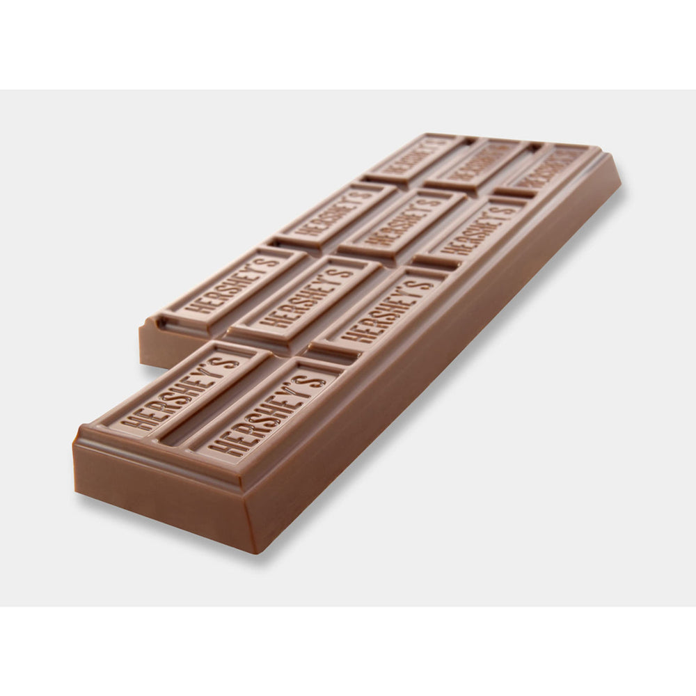 HERSHEY'S Milk Chocolate bars during camping or movie night.