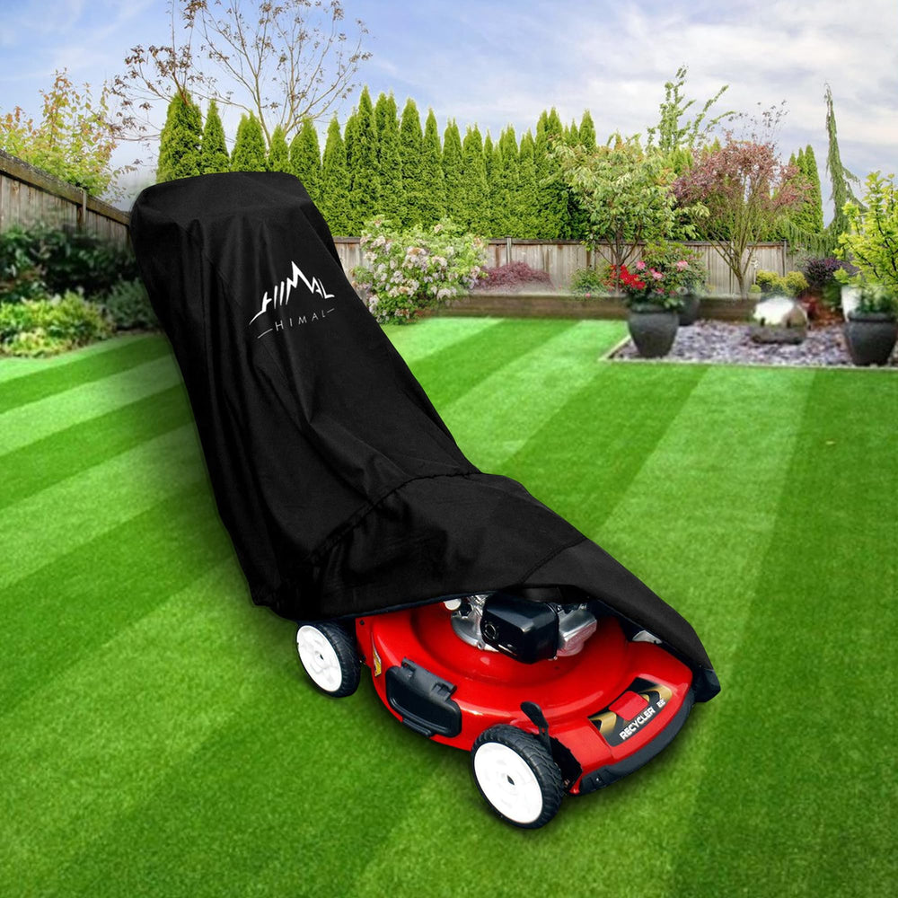 Himal Outdoors black lawn mower cover blends with garden gear