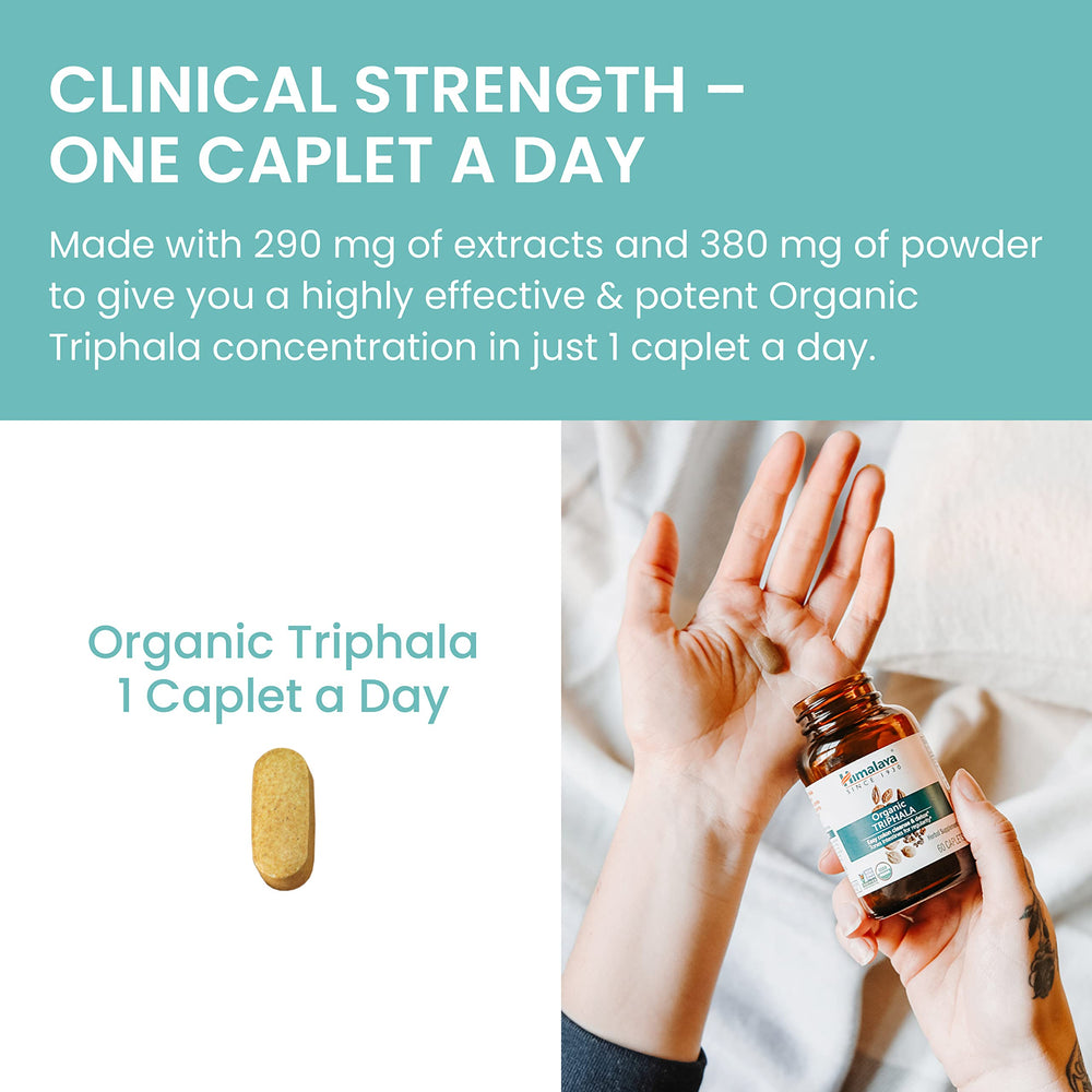 Himalaya Triphala caplets with water for daily digestion support