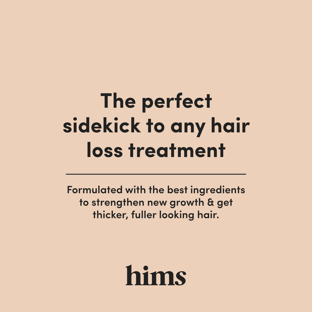 Rinse-off moment with water droplets after applying Hims Max Volume Conditioner