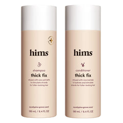 hims Thick Fix shampoo bottle closeup for refreshing scalp cleansing.
