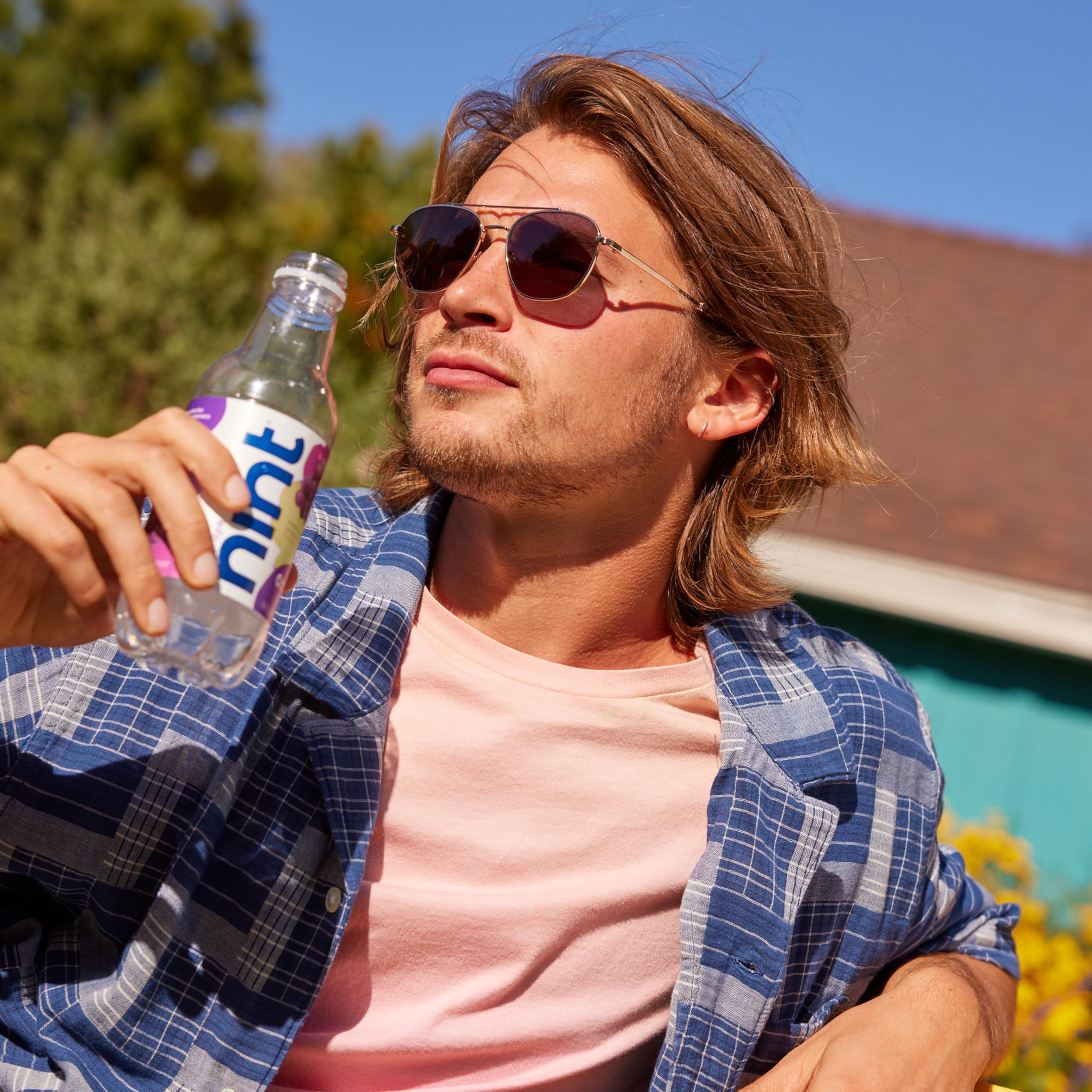 Hint Grape Fruit-Infused Water bottle highlights vegan, kosher-friendly hydration without calories.