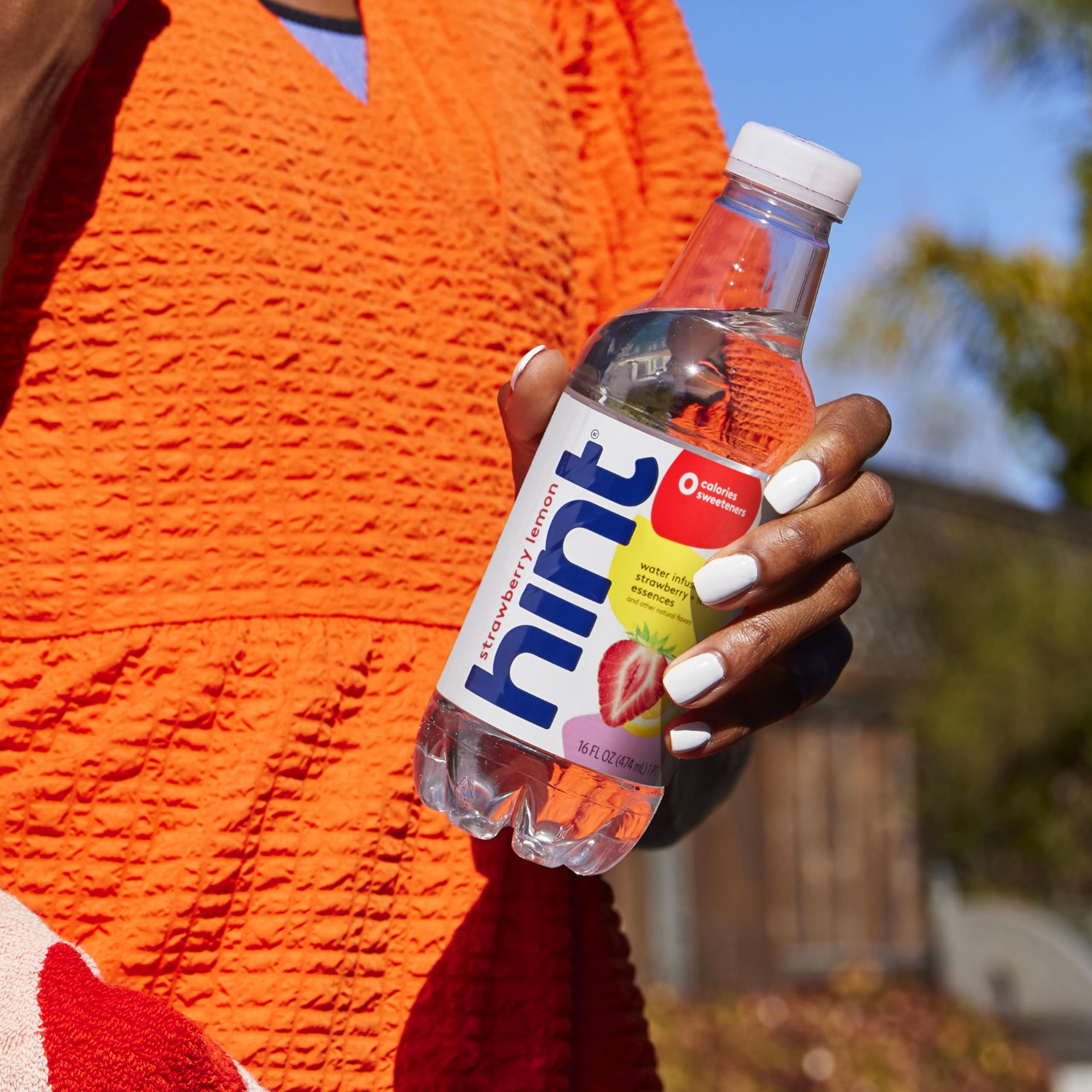 Hint on-the-go bottle pack scene suggests easy packing for travel.
