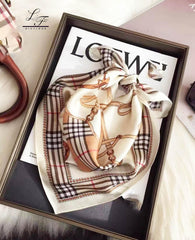 Hioyiwse satin head scarf worn as a stylish head wrap.