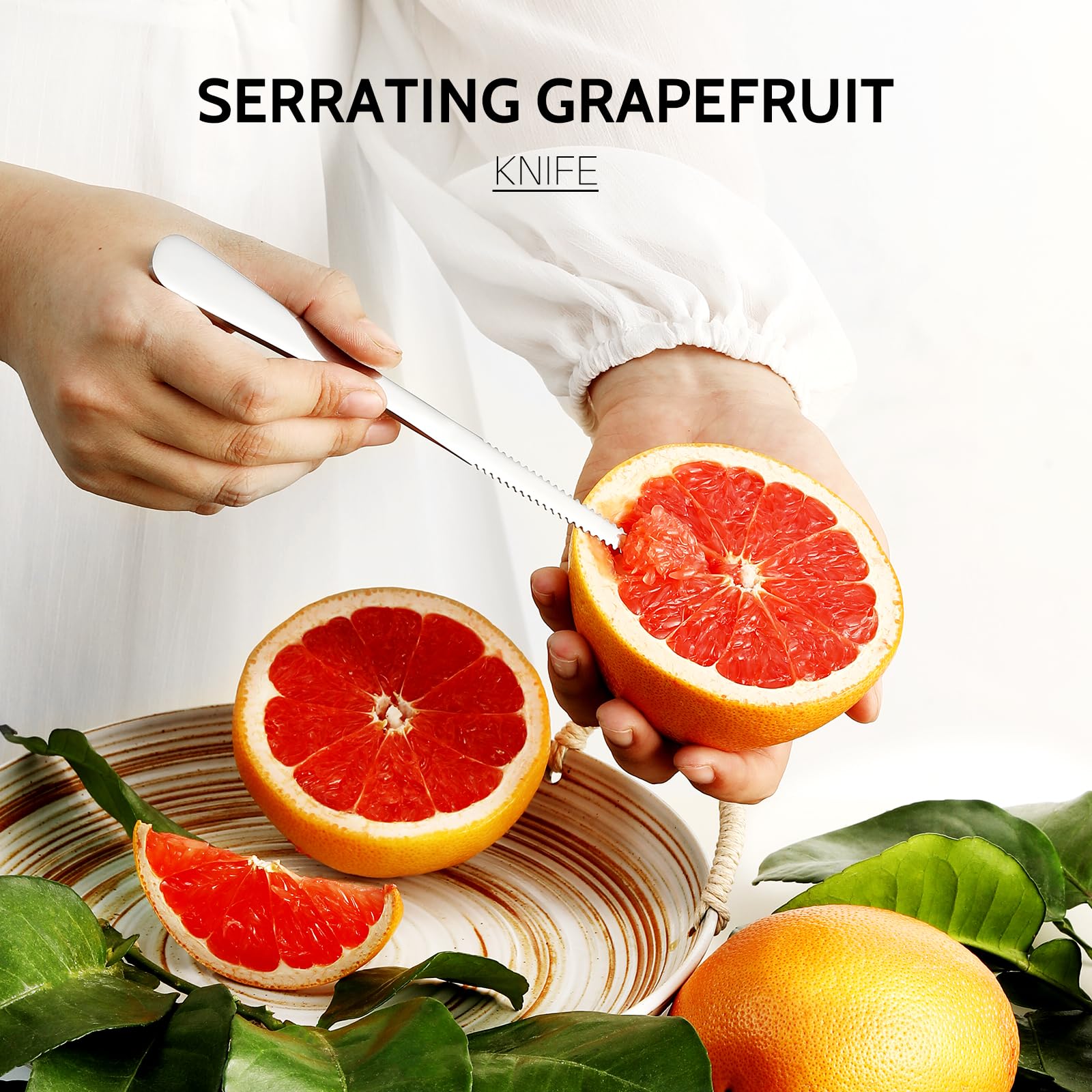 Hiware spoons used to remove grapefruit segments during breakfast.
