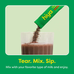 Hiya Kids Greens Powder Sticks close-up reveals kale, broccoli, and berries as real ingredients.