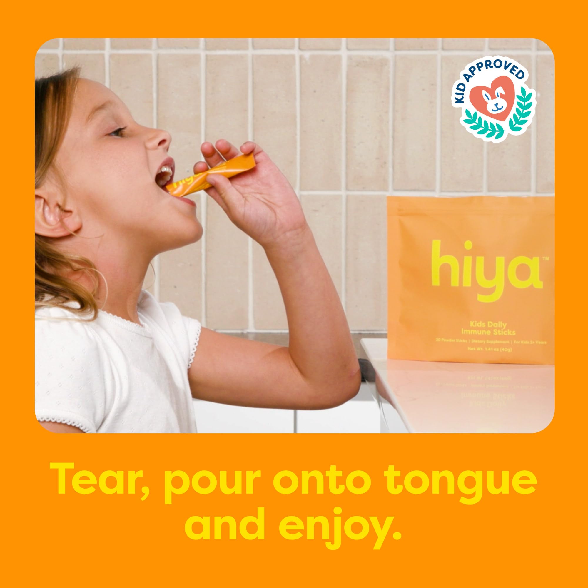 Hiya orange-stick on tongue demonstrates convenient no-cup dosing for toddlers.