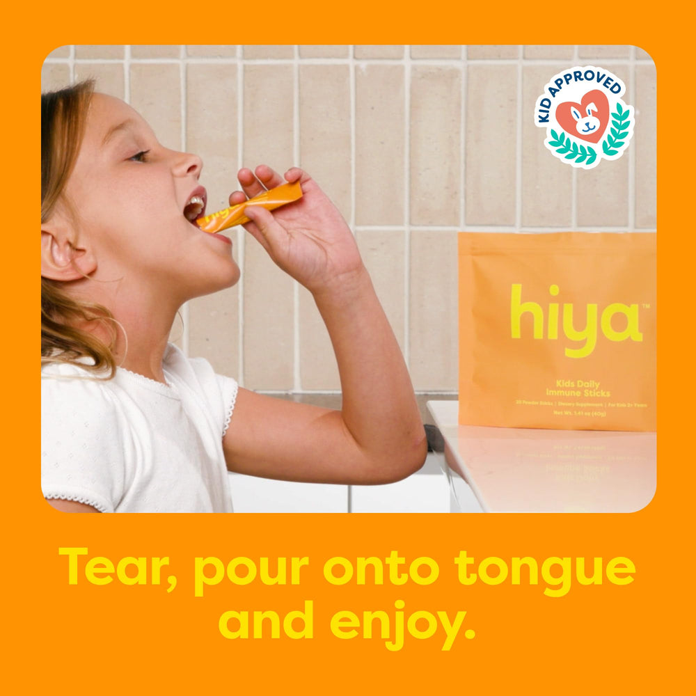 Hiya orange-stick on tongue demonstrates convenient no-cup dosing for toddlers.