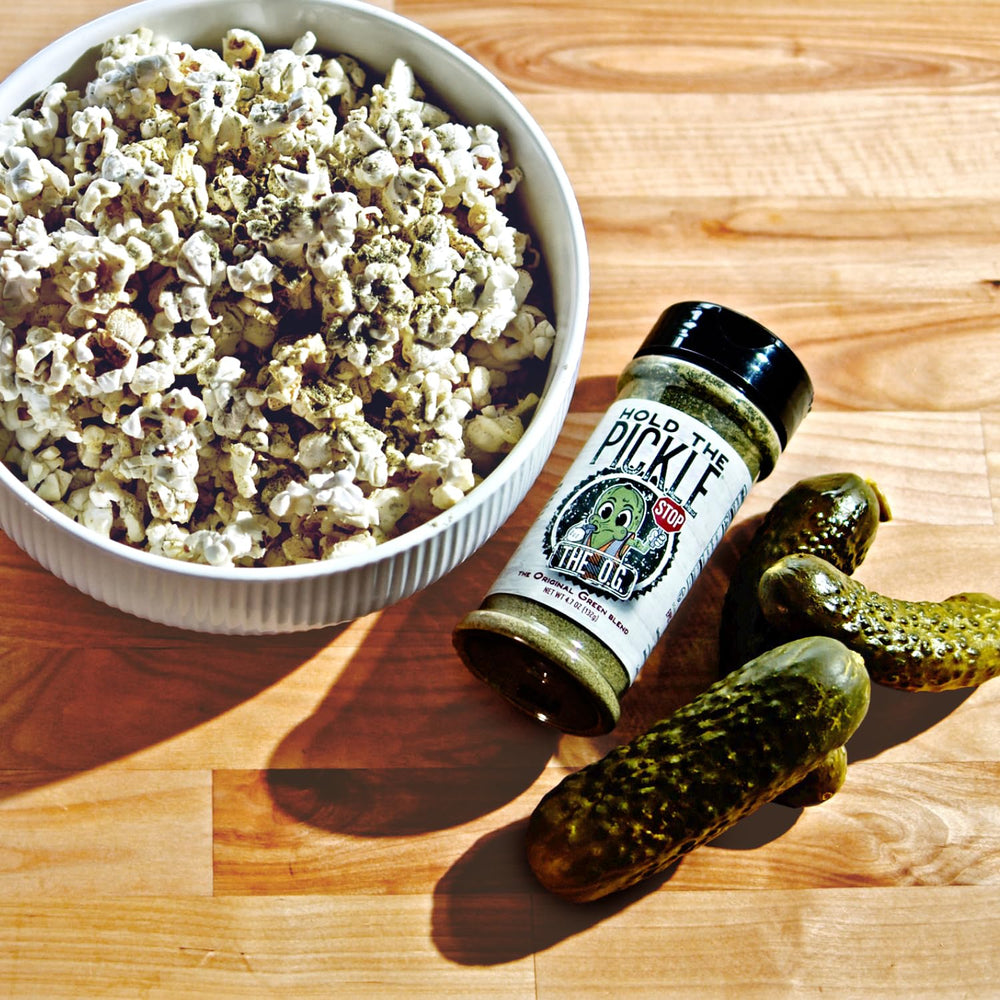 Hold The Pickle O.G. Dill Seasoning sprinkled on pizza for tangy dill twist